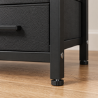 Détail du pied réglable et du cadre métallique noir.